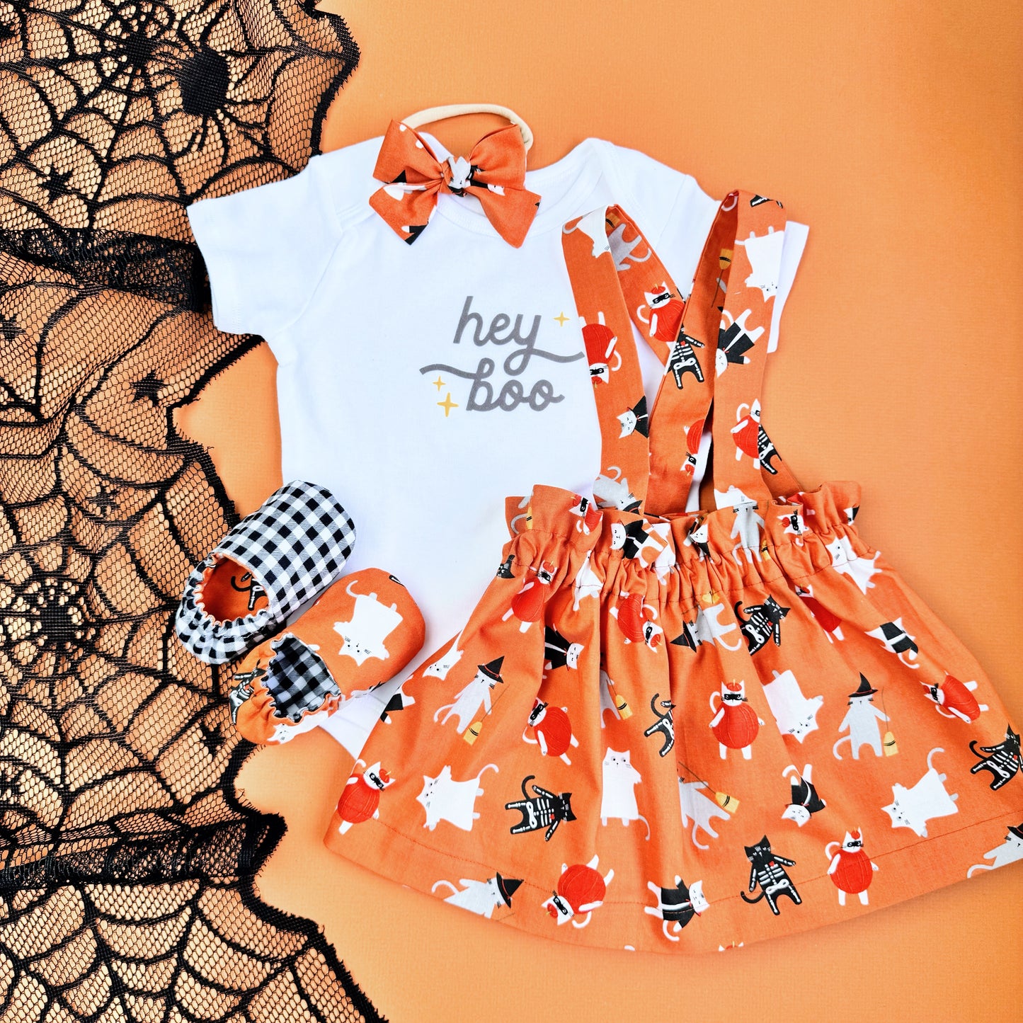 Halloween Baby Girl outfit. Matching outfit including skirt, Slippers, bow and bodysuit.