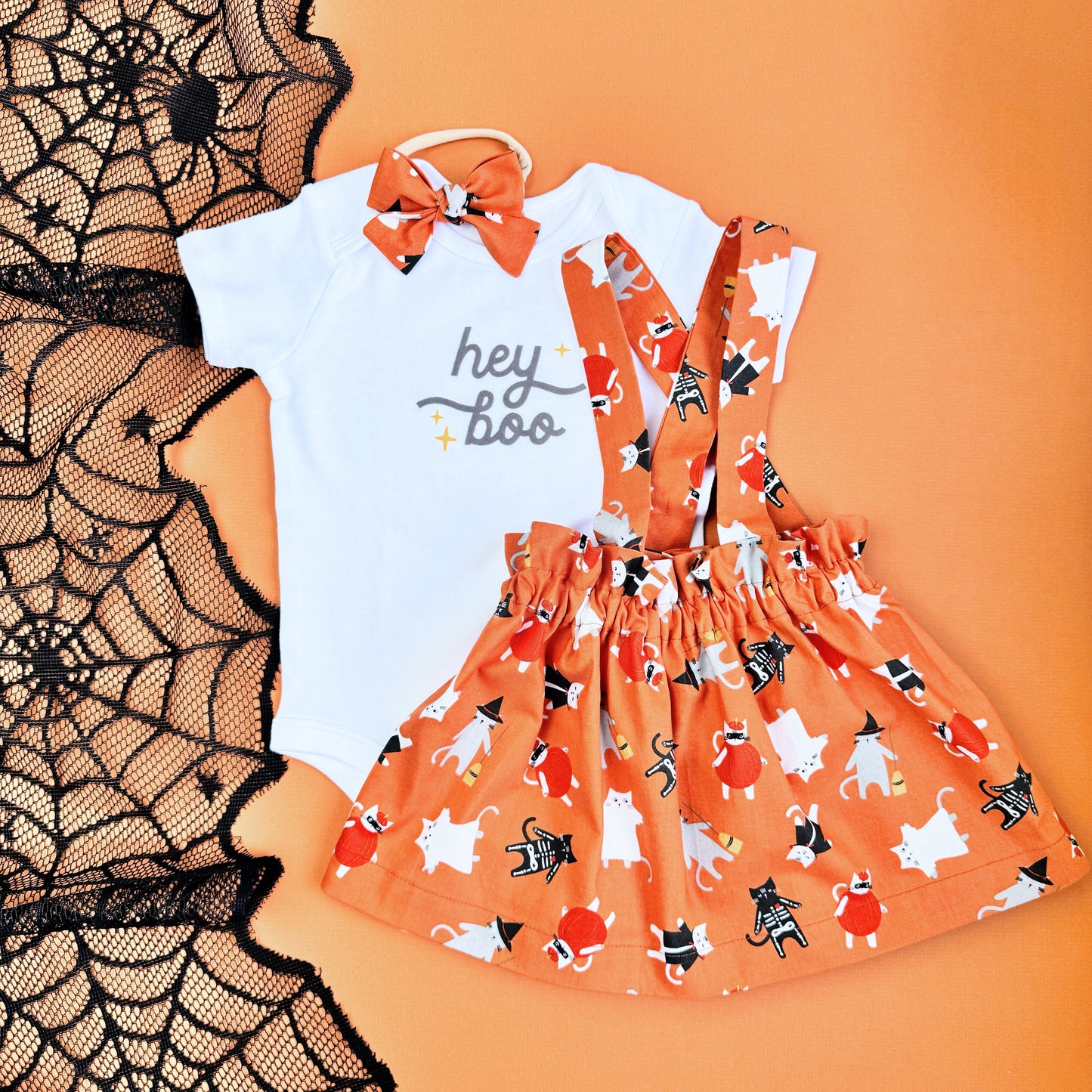 Halloween Baby Girl outfit. Matching outfit including skirt, Slippers, bow and bodysuit.