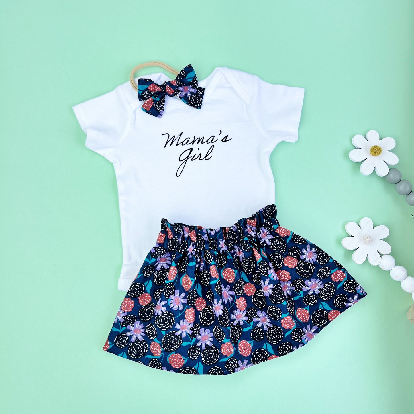 Mother's Day Baby Girl outfit. Mama's girl bodysuit, skirt, slippers and bow.