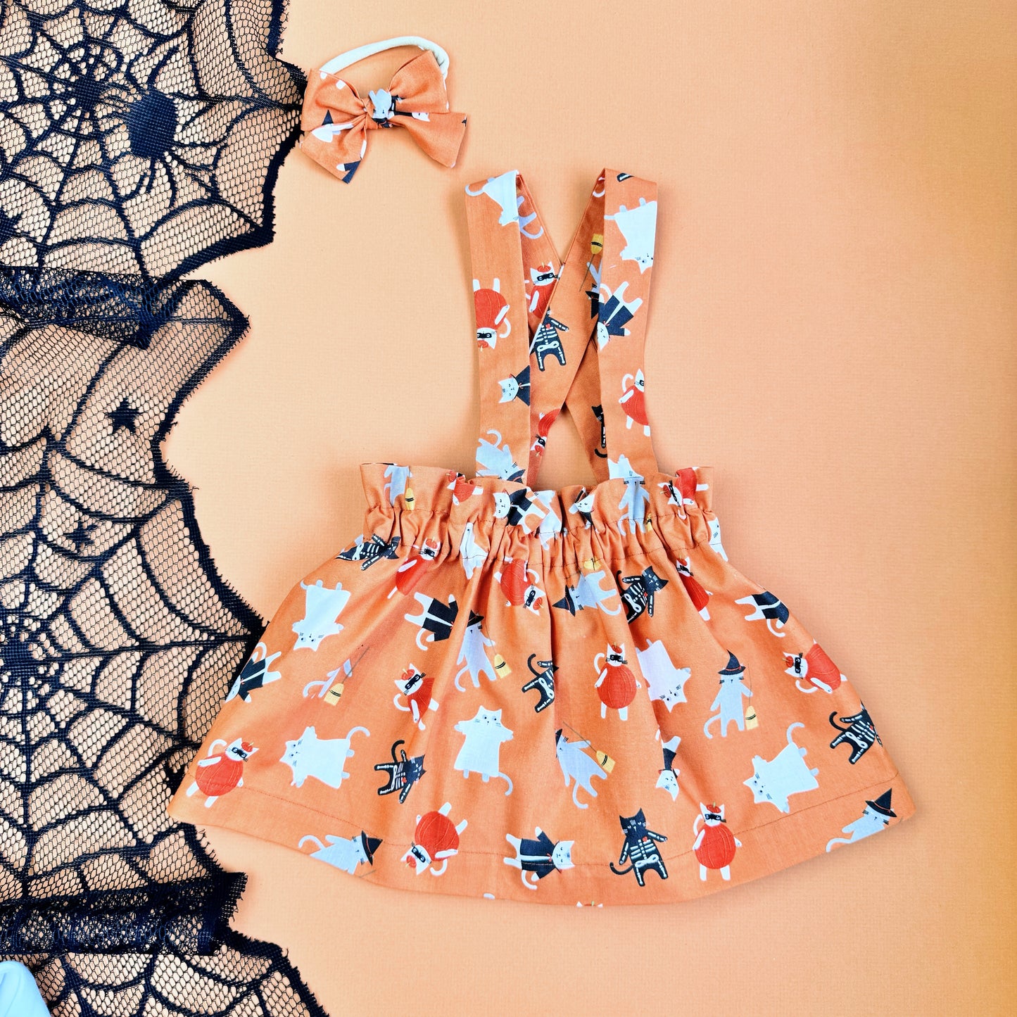 Halloween Baby Girl outfit. Matching outfit including skirt, Slippers, bow and bodysuit.